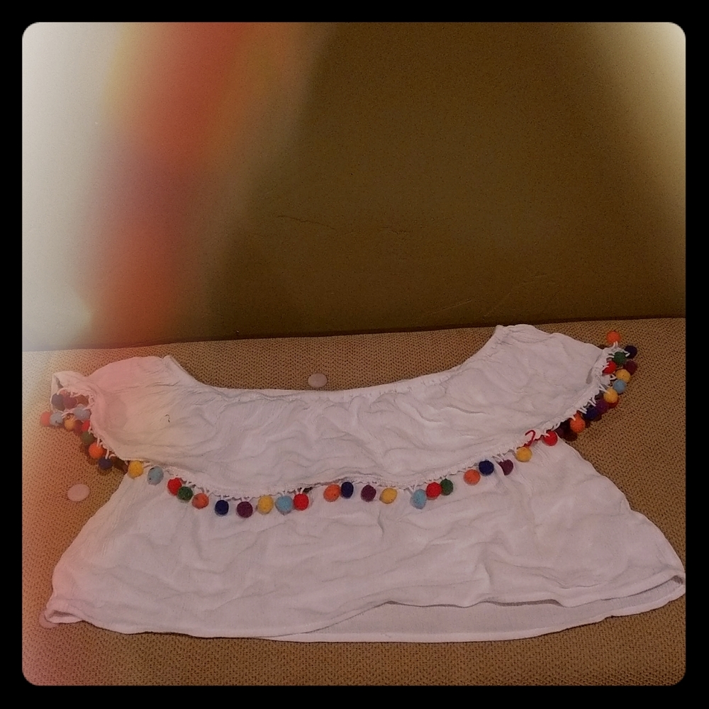 Off shoulder fiesta pompom top